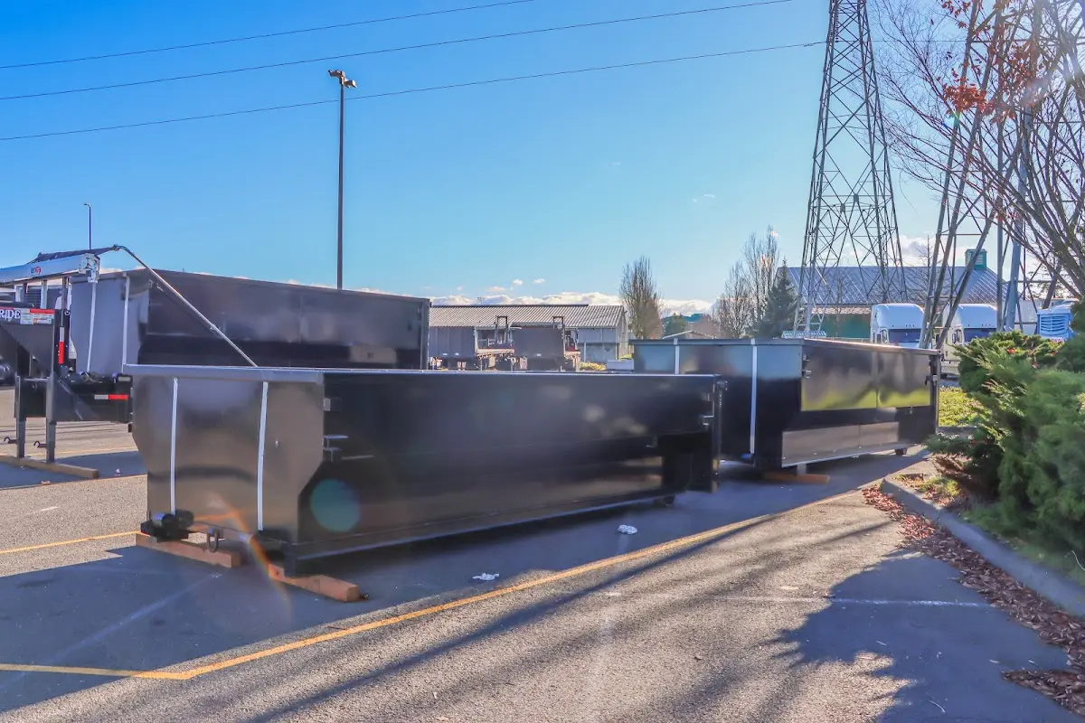 Roll-off dumpster ready for waste disposal at job site for Concrete Dumpster Rental in Oil City